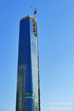 Skyscraper_With_Construction_Crane_And_Blue_Sky_Givatayim_Israel_architecture_Photography_Canon_EOS_R5_Mark_II_2025_001.JPG