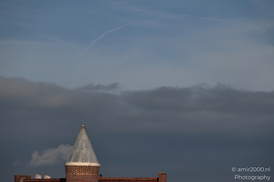 Clouds_Above_A_Brick_Building_With_A_Dome_Roof_Kattenburgerplein_Amsterdam_Netherlands_Cityscape_Photography_Canon_EOS_R5_Mark_II_2025_001.JPG