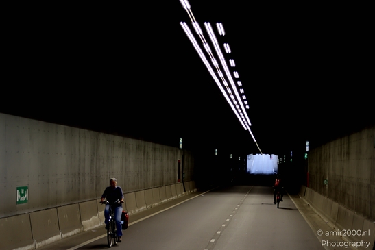 Cycling_on_De_Ruijterkade_under_Centraal_Station_during_Sail_2025_750_to_the_city_Amsterdam_Netherlands_Cityscape_Photography_Canon_EOS_R5_Mark_II_2025_002.JPG