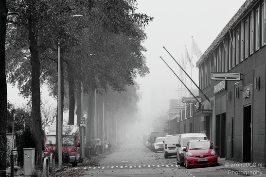 Foggy_City_Street_With_Red_Car_And_White_Van_Amsterdam_Netherlands_Cityscape_Photography_Canon_EOS_R5_Mark_II_2025_001.JPG