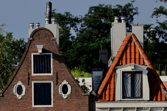Historic_Brick_Buildings_With_Red_Amsterdam_Netherlands_Cityscape_Photography_Canon_EOS_R5_Mark_II_2025_001.JPG