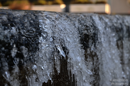 Icicles_On_A_Fountain_Edge_In_Winter_Amsterdam_Netherlands_Cityscape_Photography_Canon_EOS_R5_Mark_II_2025_002.JPG