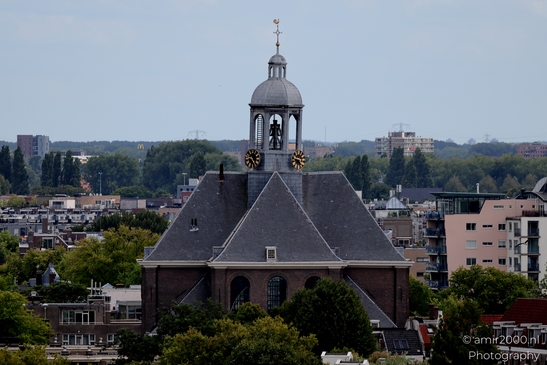 Looking_at_the_city_and_the_roof_tops_Amsterdam_Netherlands_Cityscape_Photography_Canon_EOS_R5_Mark_II_2025_010.JPG