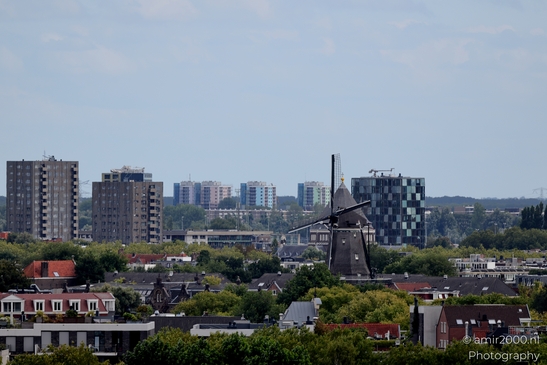 Looking_at_the_city_and_the_roof_tops_Amsterdam_Netherlands_Cityscape_Photography_Canon_EOS_R5_Mark_II_2025_011.JPG