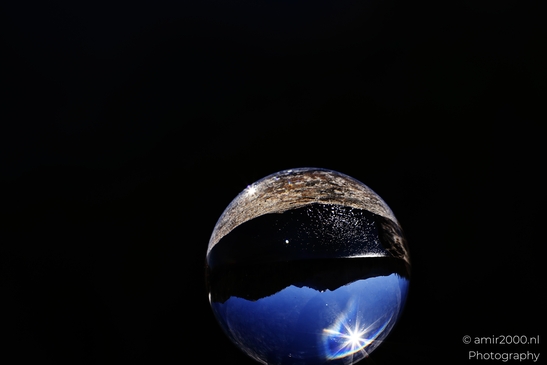 Near Rocky Mountain National Park, Glass Ball Creative Series, a glass ball shows a crisp - image from year 2025 #002