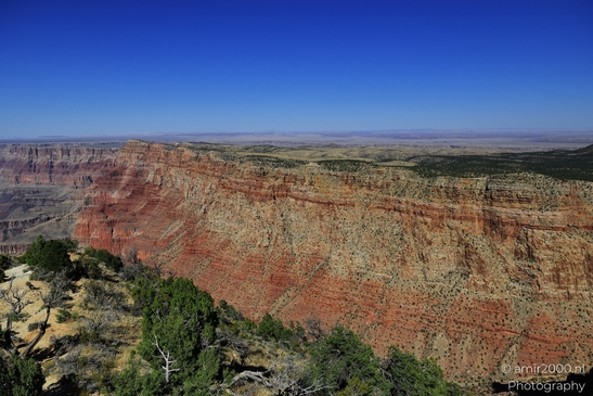 Lipan Point overlook wide Colorado River views cutting through layered canyon walls under clear - image from year 2025 #008