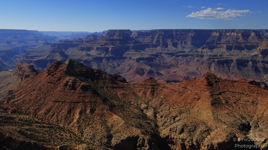 Lipan Point overlook wide Colorado River views cutting through layered canyon walls under clear - image from year 2025 #010