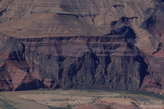 Lipan Point overlook wide Colorado River views cutting through layered canyon walls under clear - image from year 2025 #014