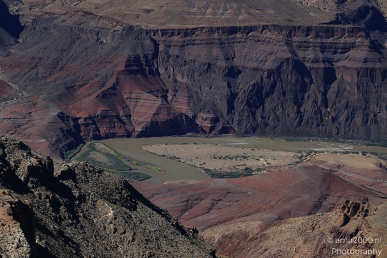 Lipan Point overlook wide Colorado River views cutting through layered canyon walls under clear - image from year 2025 #015