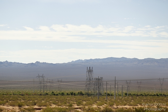 Desert Power Lines Nevada USA in Utility Photography Series. The desert power lines stretching - image from year 2025 #001