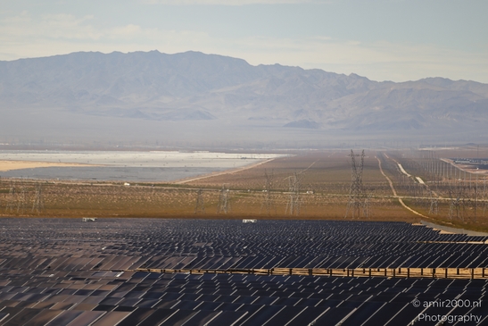 Desert Solar Farm Nevada USA in Utility Photography Series. A vast desert solar farm stretches - image from year 2025 #004