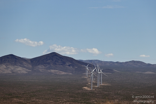Desert Wind Farm in Arizona USA in Utility Photography Series. The wind farm stands out against - image from year 2025 #004