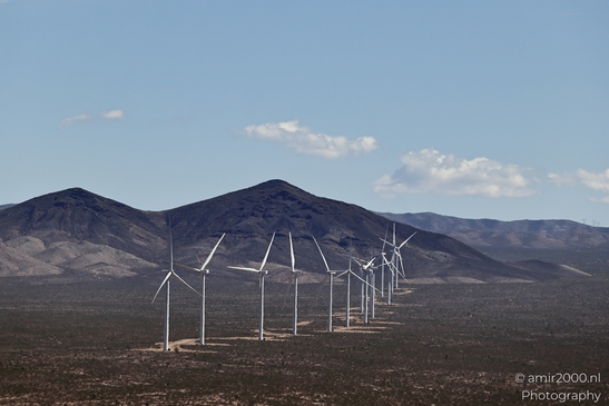 Desert Wind Farm in Arizona USA in Utility Photography Series. A desert wind farm under a clear - image from year 2025 #006