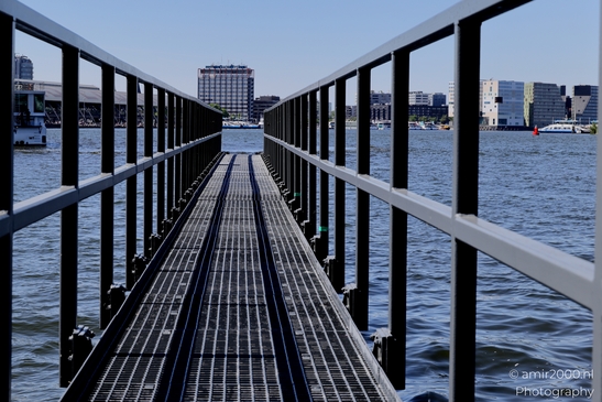 Dock_walkway_with_railings_over_the_IJ_Amsterdam_Netherlands_Miscellaneous_Photography_Canon_EOS_R5_Mark_II_2025_001.JPG