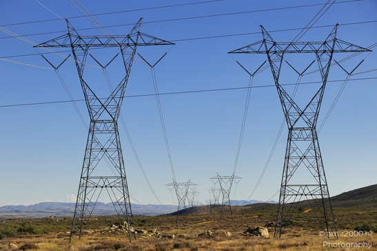 Power Lines In Desert Arizona USA in Utility Photography Series. The power lines stretch into - image from year 2025 #001