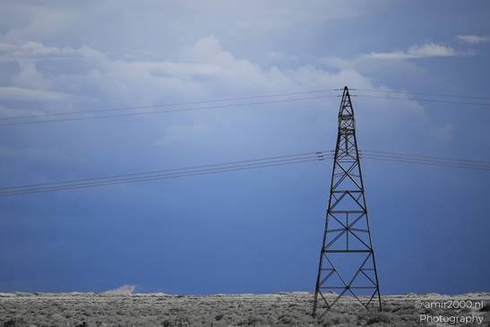Power Lines In Desert Arizona USA in Utility Photography Series. A power line cuts across the - image from year 2025 #006
