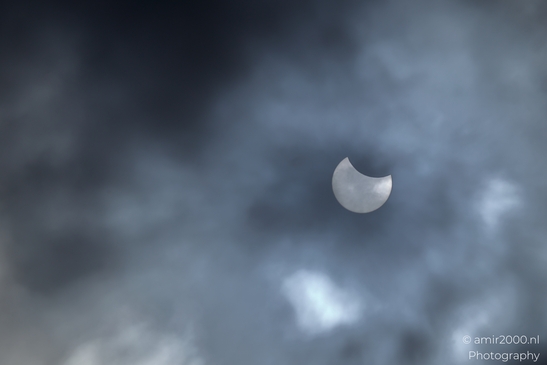 Partial_Solar_Eclipse_framed_by_drifting_clouds_Noord_Holland_Netherlands_Nature_Photography_Canon_EOS_R5_Mark_II_2025_001.JPG