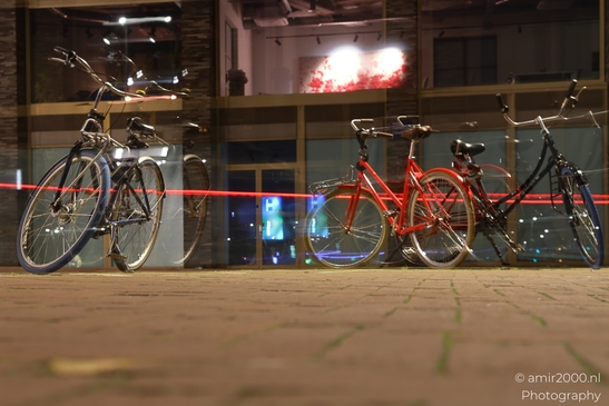 Bicycles_On_Urban_Pavement_At_Night_Amsterdam_Netherlands_Night_Photography_Canon_EOS_R5_Mark_II_2025_001.JPG
