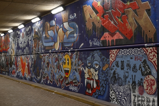 Colorful graffiti on wall of Dijksgracht in Amsterdam, Netherlands in Amsterdam Netherlands. . - image from year 2025 #006