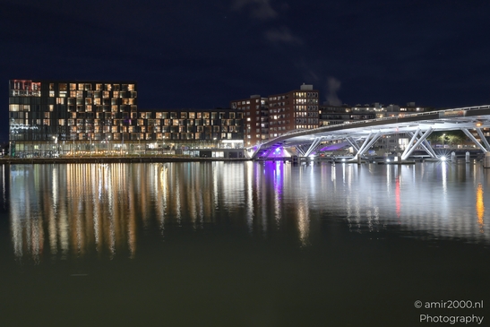 The Jan Schaeferbrug at night in Amsterdam, Netherlands, with the illuminated Java eiland across - image from year 2025 #001