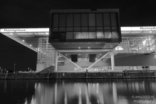 The modern architecture of the Muziekgebouw aan 't IJ in Amsterdam, Netherlands, illuminated at - image from year 2025 #001