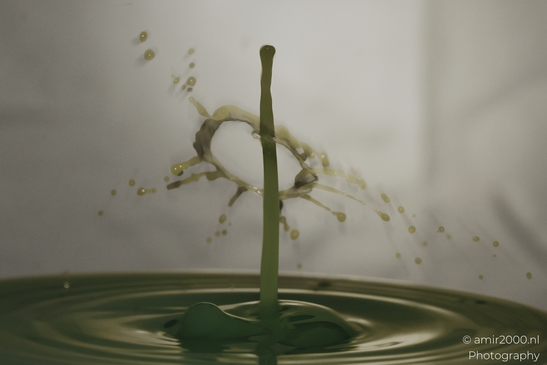 Water drops creatively collide in a yellow series, capturing a moment of artistic interaction in - image from year 2025 #004