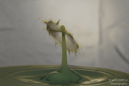 Water drops creatively collide in a vibrant yellow series in Water Drops Creative Series. . - image from year 2025 #015