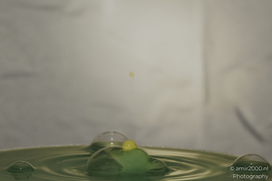 Water drops in a creative series, with yellow and green hues dancing together in Water Drops - image from year 2025 #025