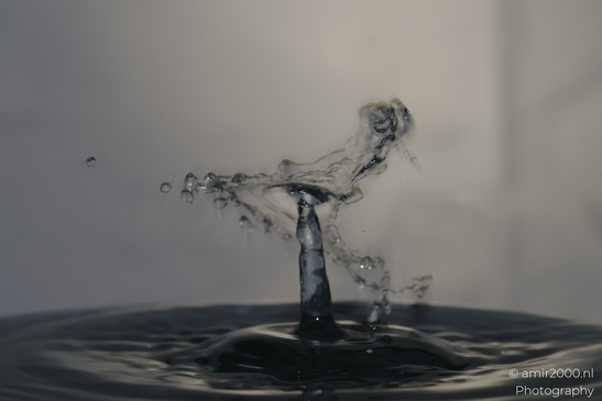 Water droplet splashes in a creative series, showcasing high-speed liquid collisions in Water - image from year 2025 #003