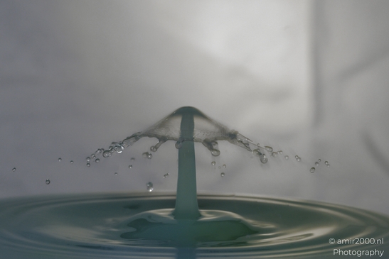 Water droplet splashes captured in a single frame, showcasing the dynamic nature of liquid - image from year 2025 #013