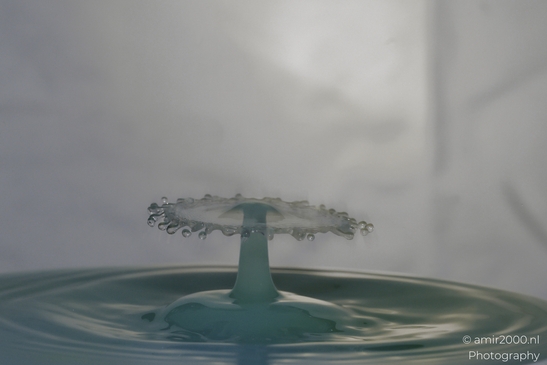 Water droplets frozen in a dynamic dance of high-speed liquid collision sculptures in Water - image from year 2025 #014