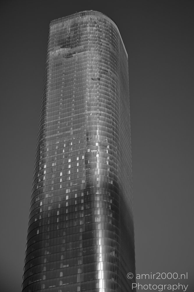 Beyond Tower glass facade curving above Givatayim Israel