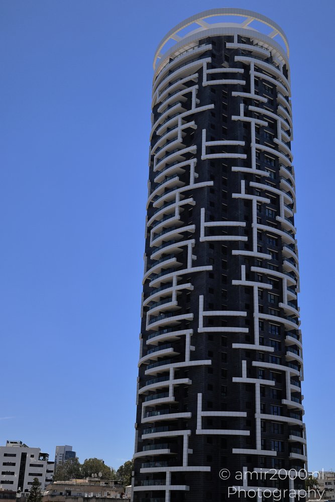 Metro Tower rising above low-rise buildings in Ramat Gan, Israel