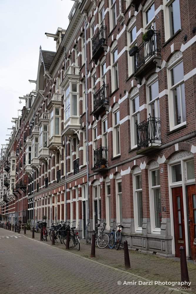 In Amsterdam Netherlands, a row of traditional buildings.