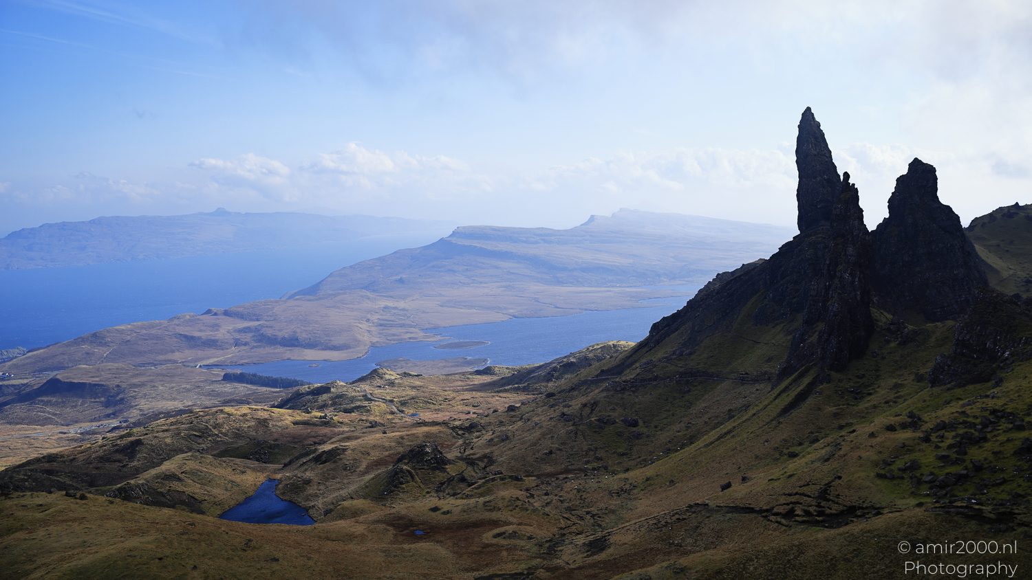 Old Man of Storr rock pinnacles above coastal landscape on Isle of Skye