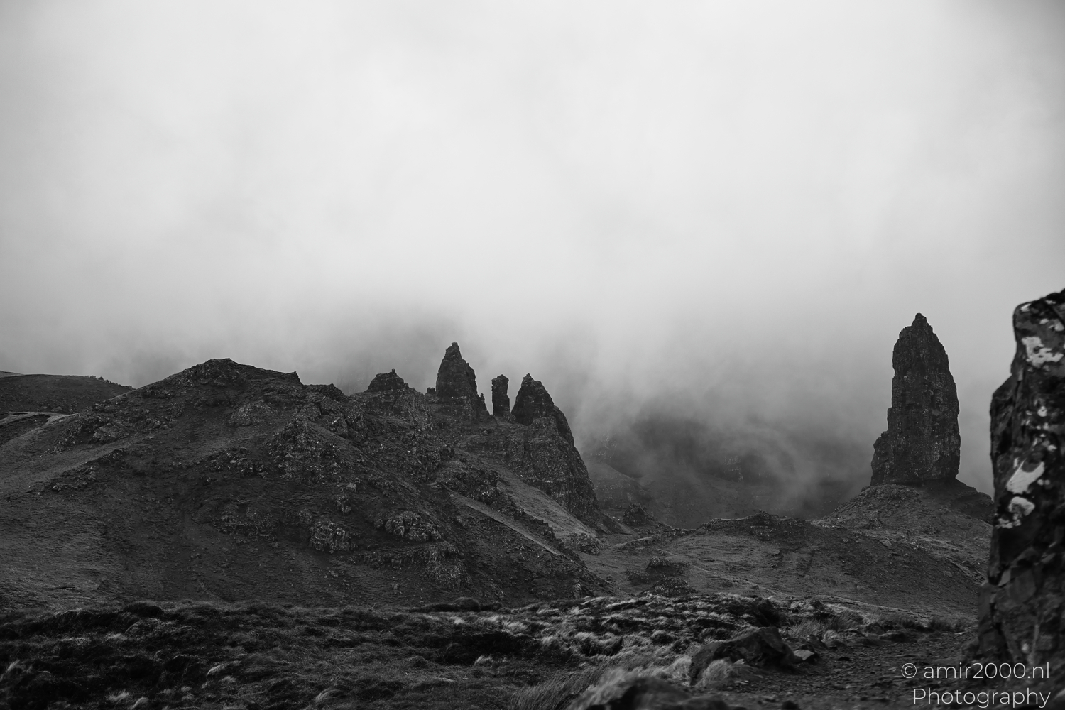 Mist covering Old Man of Storr rock pinnacles on Isle of Skye