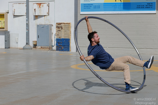 Cyr_Wheel_Acrobats_Street_Performance_Tel_Aviv_Jaffa_Israel_People_Creative_Collection_Photography_Canon_EOS_R5_Mark_II_2026_006.JPG