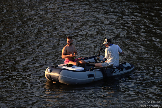 Fishermen_On_Raft_In_The_Canal_Amsterdam_Netherlands_People_Creative_Collection_Photography_Canon_EOS_R5_Mark_II_2026_001.JPG