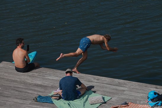 Guy_Head_Jumping_Into_Canal_Amsterdam_Netherlands_People_Creative_Collection_Photography_Canon_EOS_R5_Mark_II_2026_001.JPG