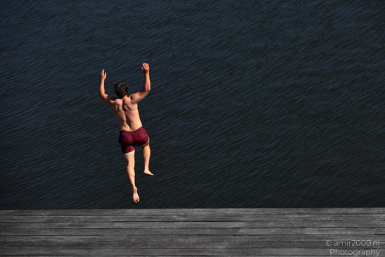 Man_Jumping_Into_Water_In_The_Canals_Of_Amsterdam_Netherlands_People_Creative_Collection_Photography_Canon_EOS_R5_Mark_II_2026_001.JPG