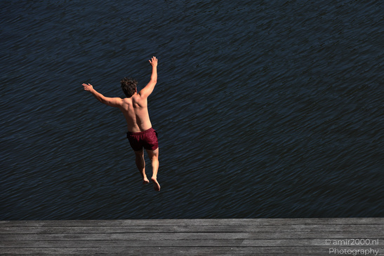 Man_Jumping_Into_Water_In_The_Canals_Of_Amsterdam_Netherlands_People_Creative_Collection_Photography_Canon_EOS_R5_Mark_II_2026_002.JPG