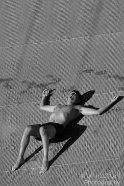 Man_On_Canal_Dock_In_Monochrome_Amsterdam_Netherlands_People_Creative_Collection_Photography_Canon_EOS_R5_Mark_II_2026_001.JPG