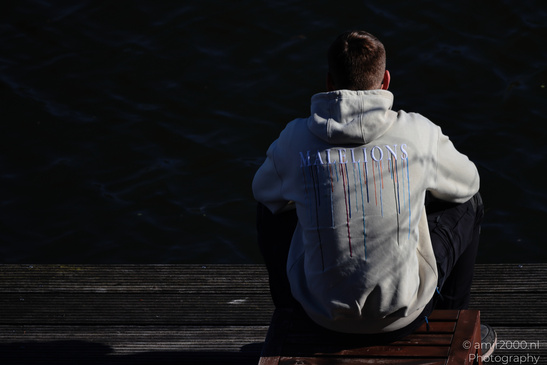 Man_Relaxing_By_The_Canal_In_Amsterdam_Netherlands_People_Creative_Collection_Photography_Canon_EOS_R5_Mark_II_2026_001.JPG