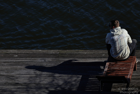 Man_Relaxing_By_The_Canal_In_Amsterdam_Netherlands_People_Creative_Collection_Photography_Canon_EOS_R5_Mark_II_2026_002.JPG