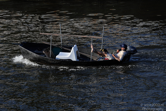 Man_Relaxing_On_Boat_Amsterdam_Netherlands_People_Creative_Collection_Photography_Canon_EOS_R5_Mark_II_2026_001.JPG