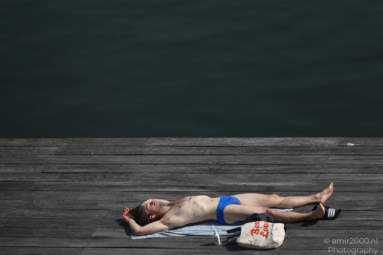 Man_Sunbathing_On_The_Deck_Amsterdam_Netherlands_People_Creative_Collection_Photography_Canon_EOS_R5_Mark_II_2026_001.JPG