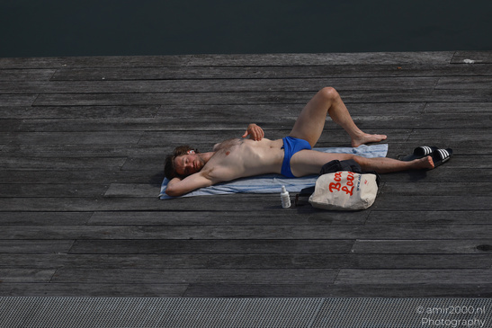 Man_Sunbathing_On_The_Deck_Amsterdam_Netherlands_People_Creative_Collection_Photography_Canon_EOS_R5_Mark_II_2026_002.JPG