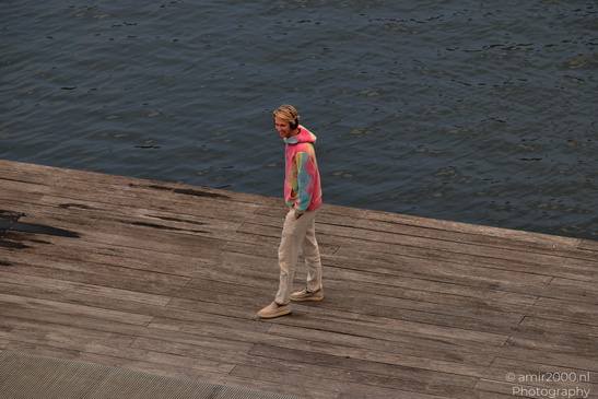 Man_Walking_On_The_Wooden_Dock_Amsterdam_Netherlands_People_Creative_Collection_Photography_Canon_EOS_R5_Mark_II_2026_001.JPG