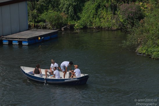 People_On_Boats_In_The_Canals_Of_Amsterdam_Netherlands_People_Creative_Collection_Photography_Canon_EOS_R5_Mark_II_2026_004.JPG