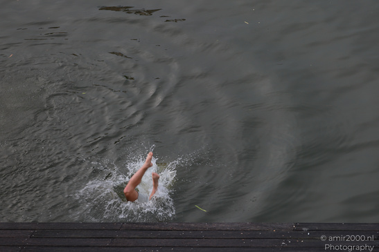 Person_Diving_Into_Water_Amsterdam_Netherlands_People_Creative_Collection_Photography_Canon_EOS_R5_Mark_II_2026_001.JPG